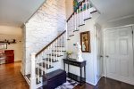Stairs to bedrooms and bathrooms